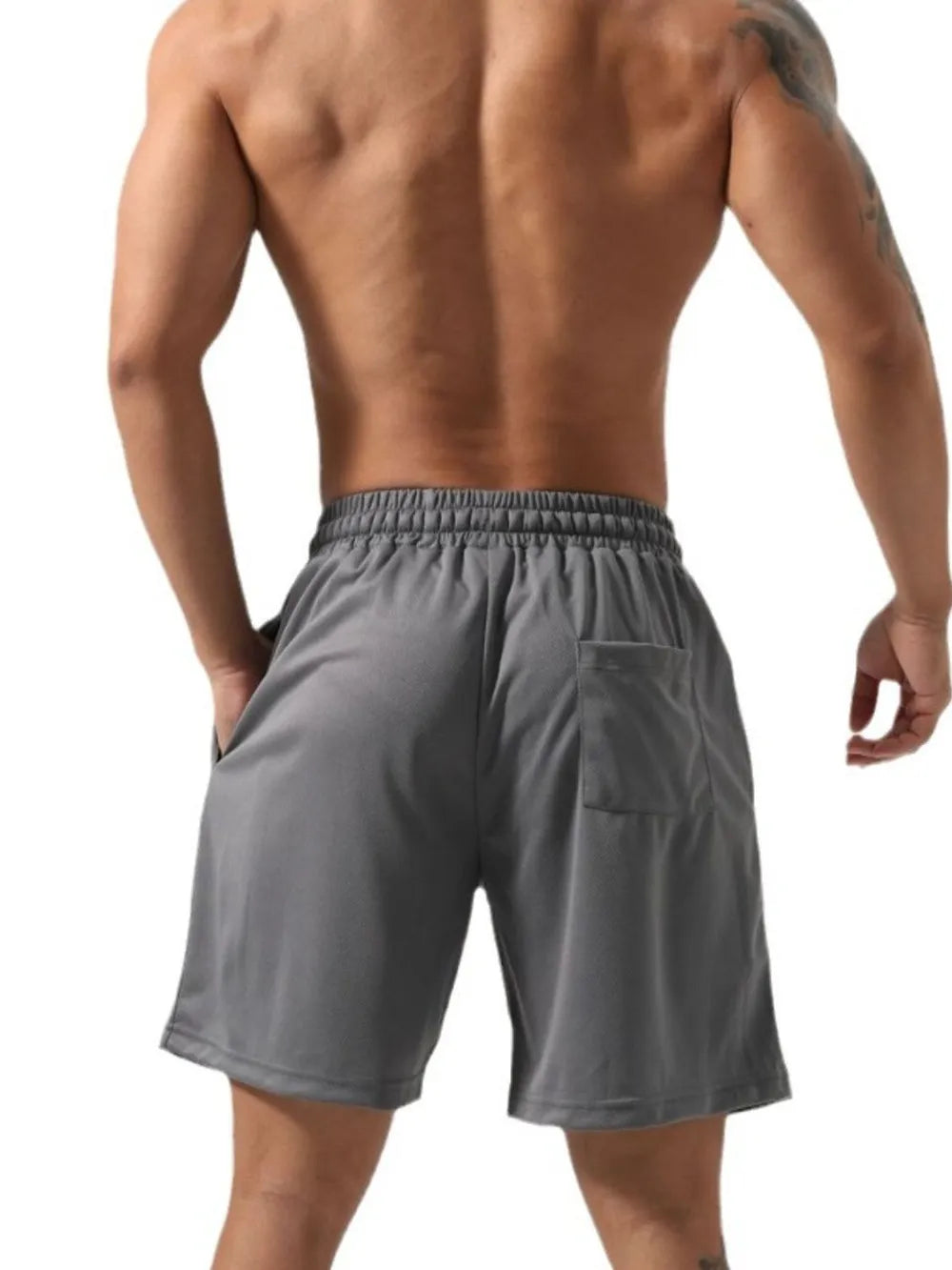 Trendsi gray drawstring gym shorts for men shown from the back with elastic waistband and pocket
