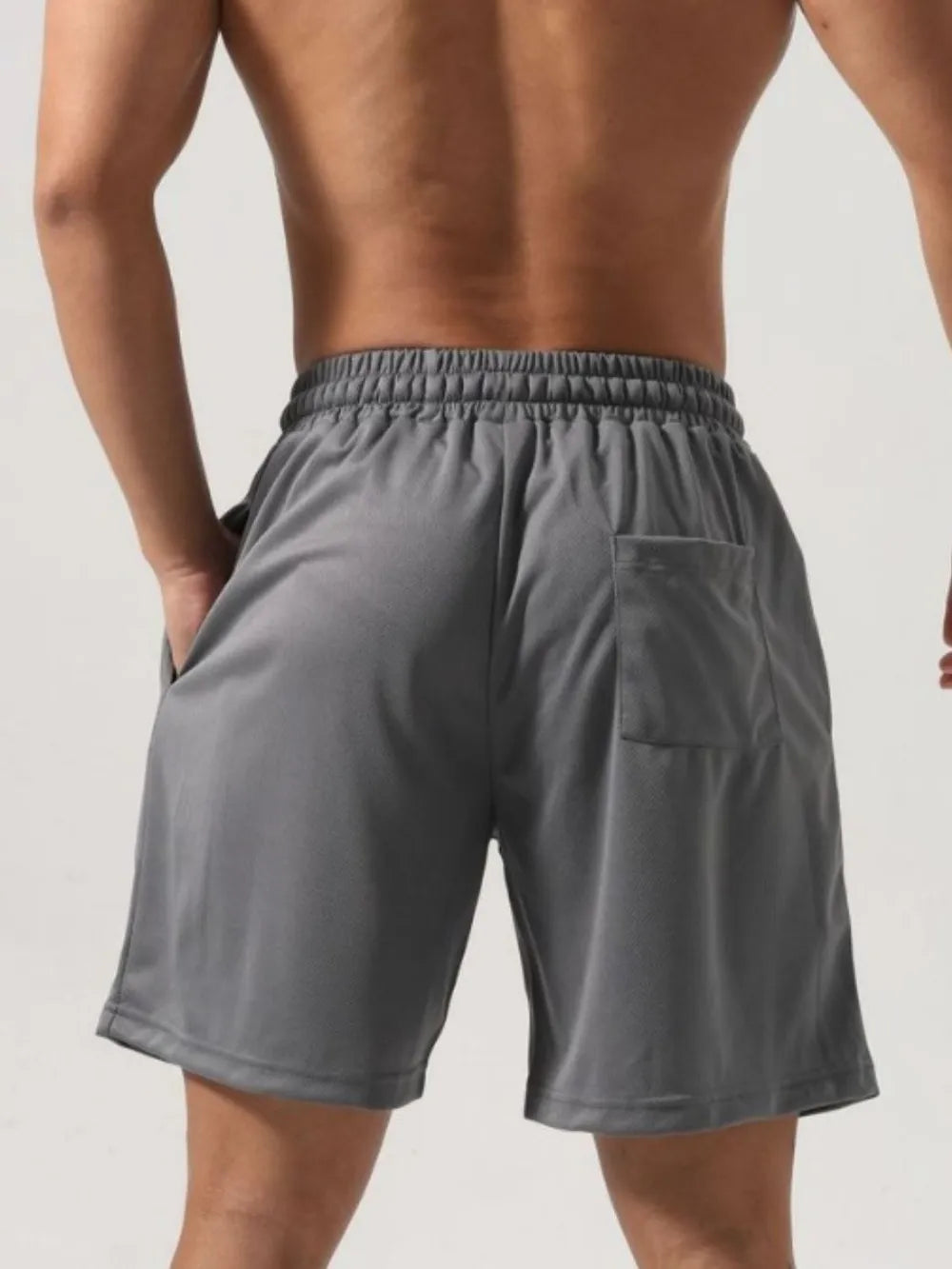 Trendsi gray drawstring gym shorts for men with back pocket and elastic waistband