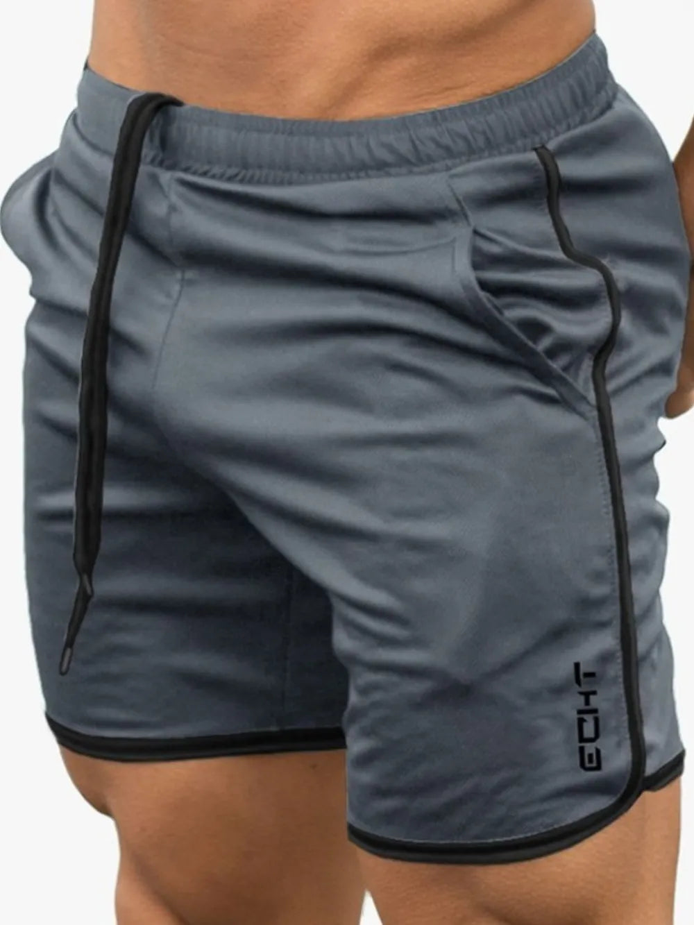 Gray comfortable men's activewear shorts with black trim and elastic waistband by Trendsi