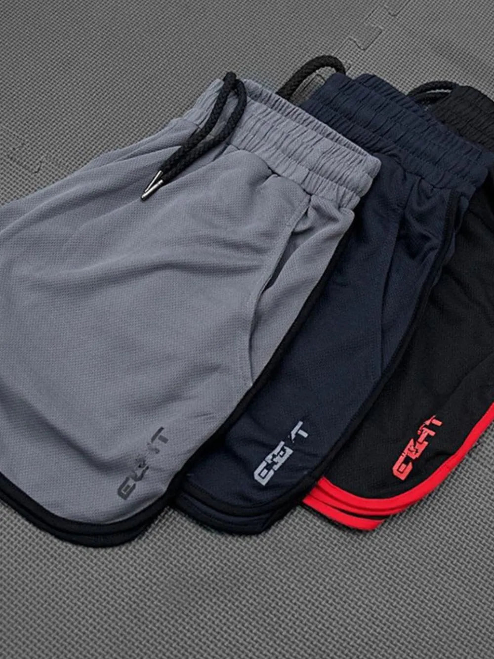 Trendsi comfortable men's activewear shorts in gray navy and black with elastic waistbands and drawstrings