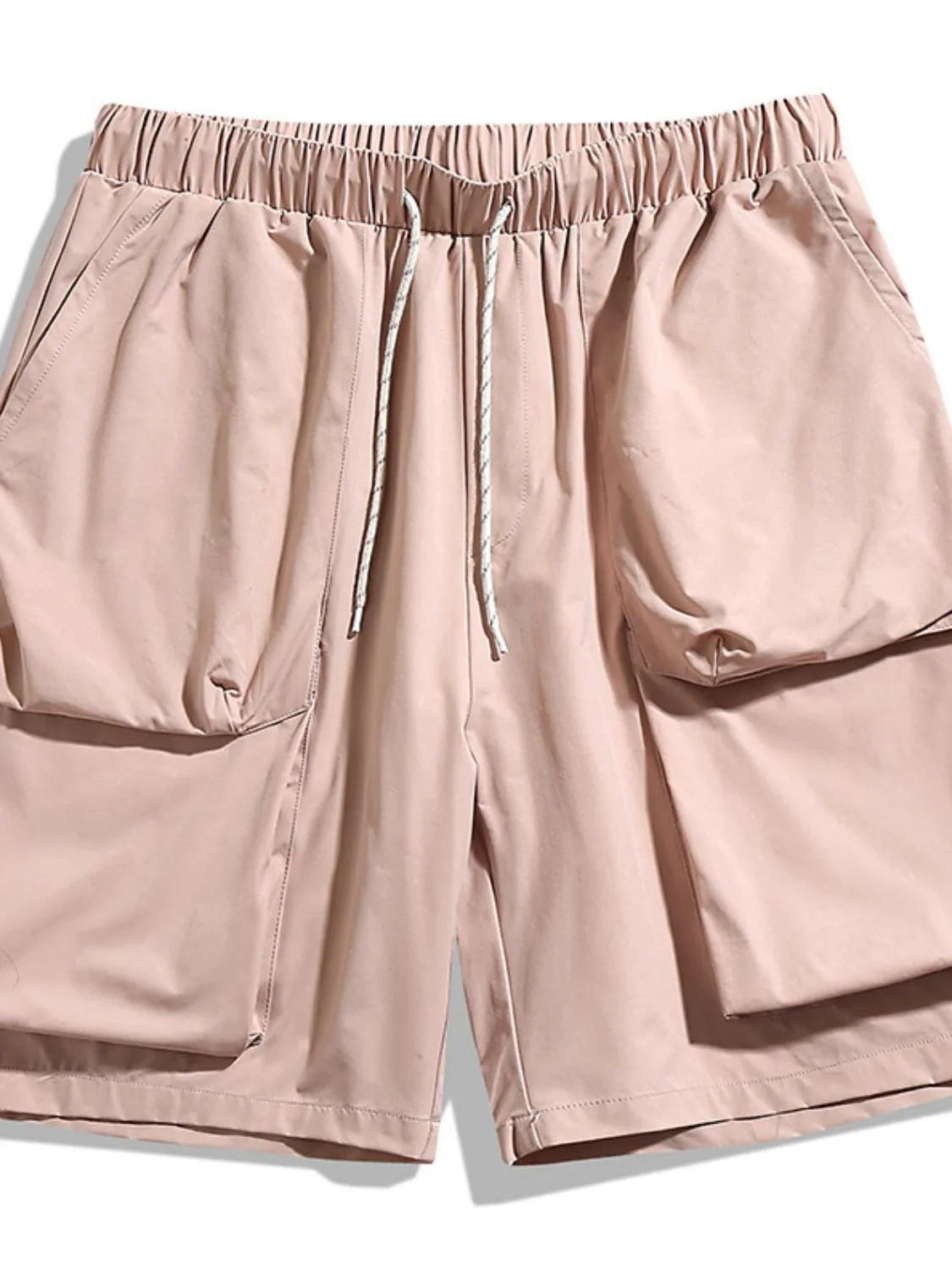 Trendsi beige drawstring pocketed shorts with an elastic waistband and large side pockets