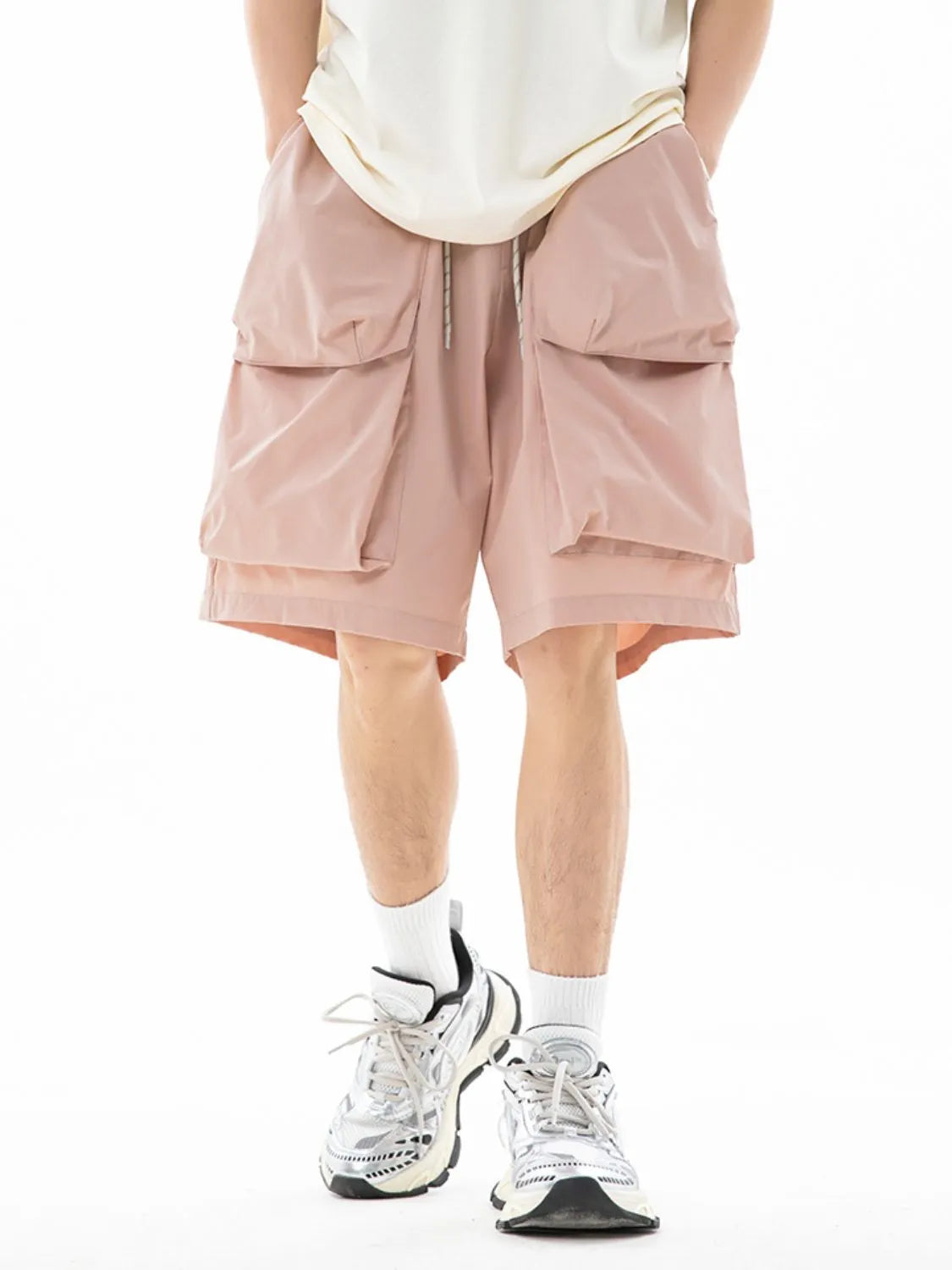Trendsi drawstring pocketed shorts in light pink with large front pockets and casual fit