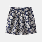 Trendsi floral print summer shorts with white flowers on navy blue fabric and elastic waistband