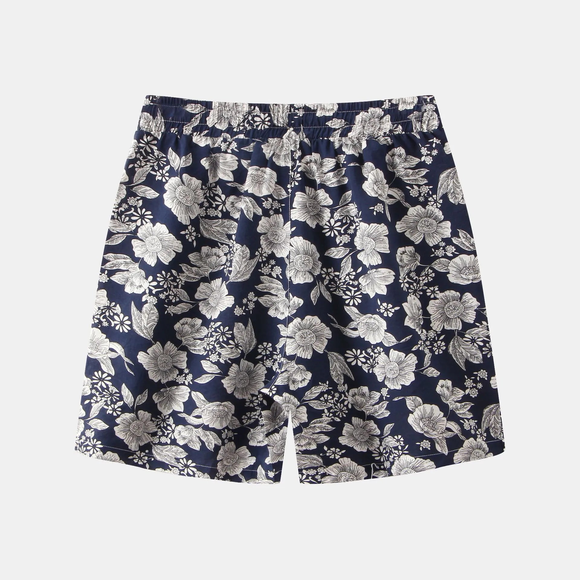 Trendsi floral print summer shorts with white flowers on navy blue fabric and elastic waistband