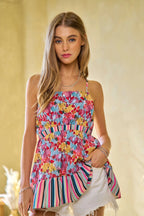 Trendsi floral smocked sleeveless top in vibrant colors with a ruffled hem and adjustable straps
