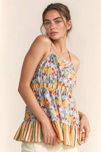 Trendsi floral smocked sleeveless top with colorful floral print and striped ruffle hem