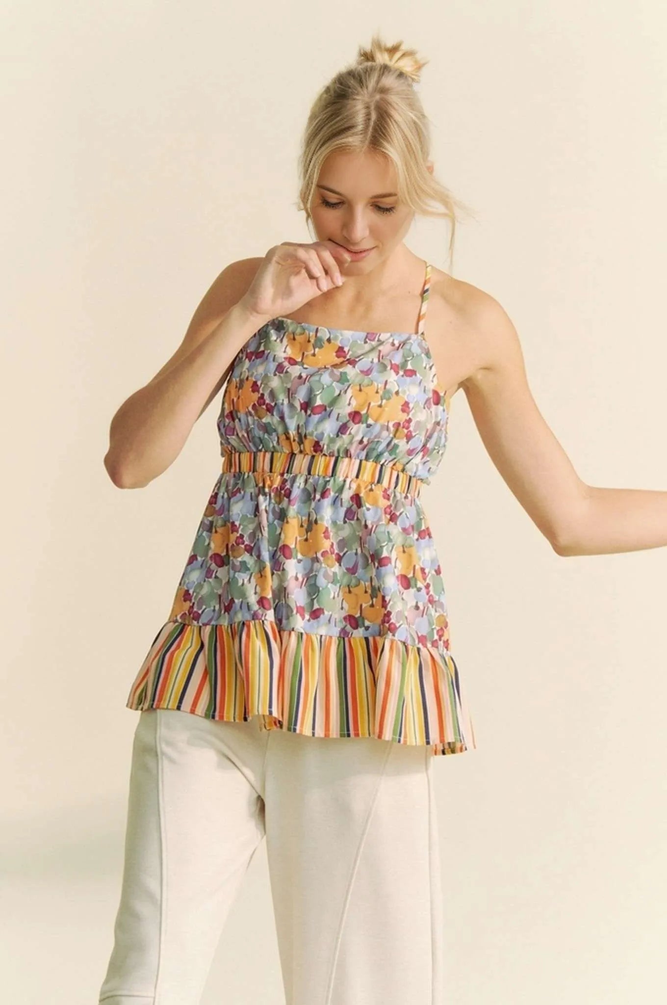 Trendsi floral smocked sleeveless top vest with colorful floral pattern and striped ruffle hem