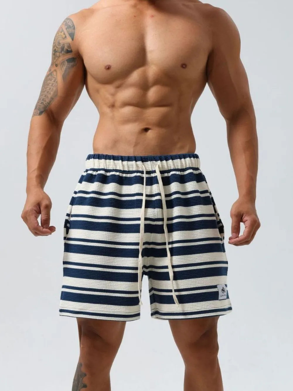 Trendsi men's striped beach shorts in navy and white with elastic waistband and drawstring