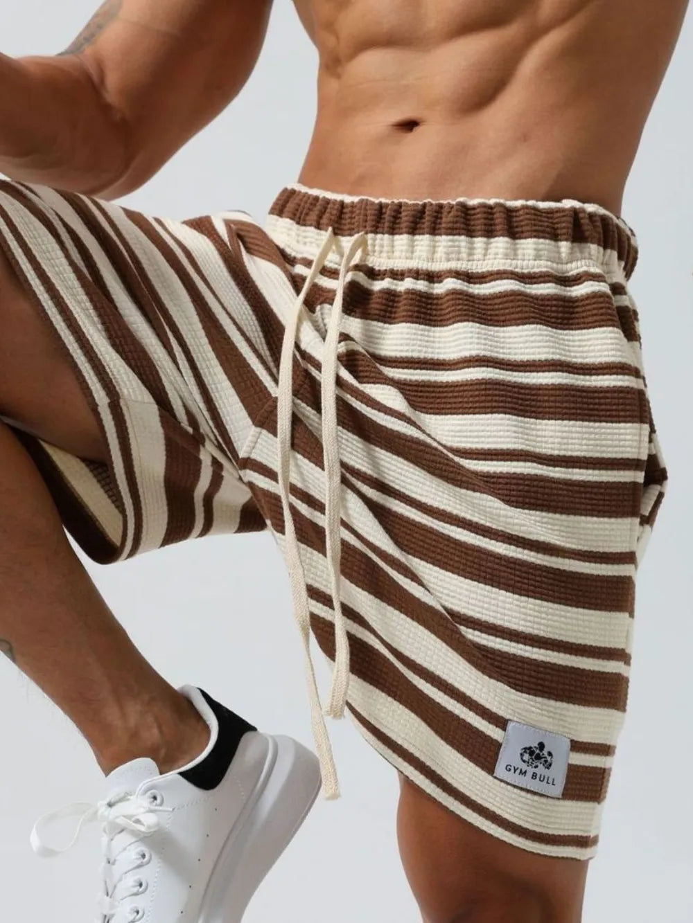 Trendsi striped beach shorts in brown and white with elastic waistband and drawstring for men