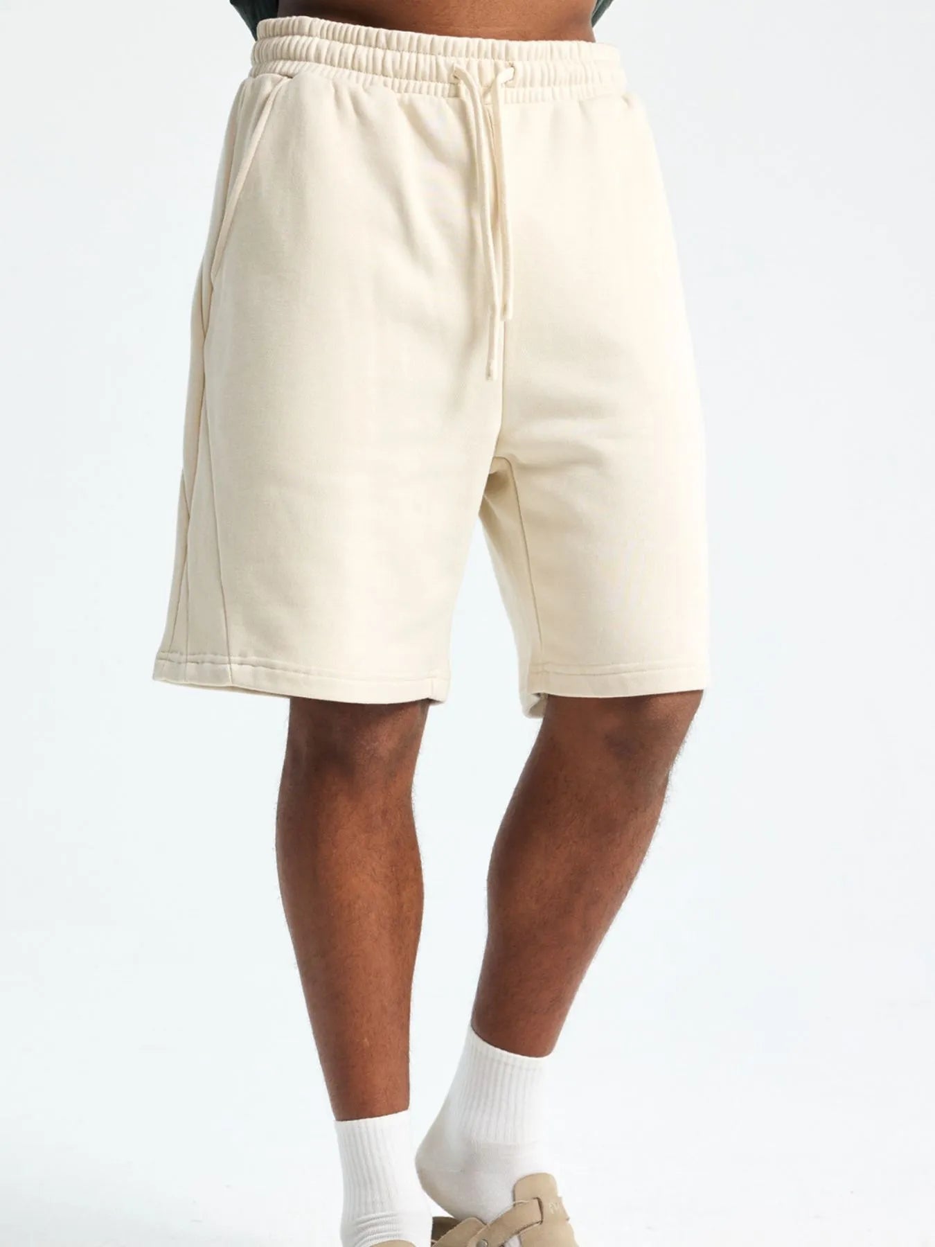 Trendsi lightweight drawstring shorts men in beige with elastic waistband and side pockets