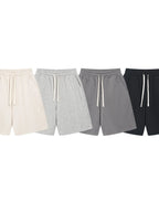 Trendsi lightweight drawstring shorts men displayed in beige gray dark gray and black colors