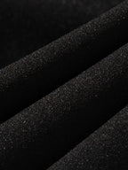 Close-up black fabric texture of men's plus size shorts by Trendsi for comfortable wear