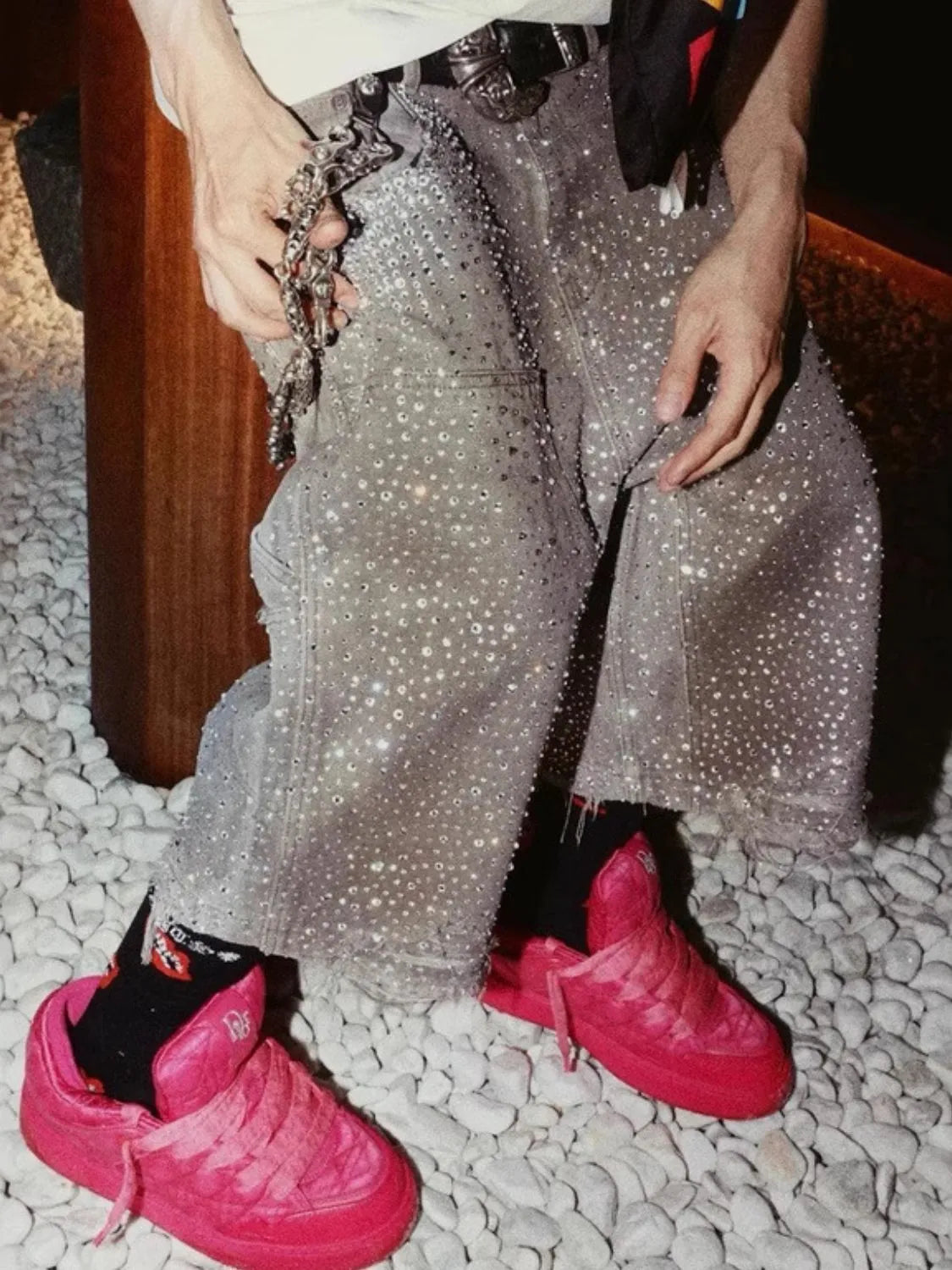 Trendsi rhinestone embellished shorts with sparkling details worn with bright pink sneakers