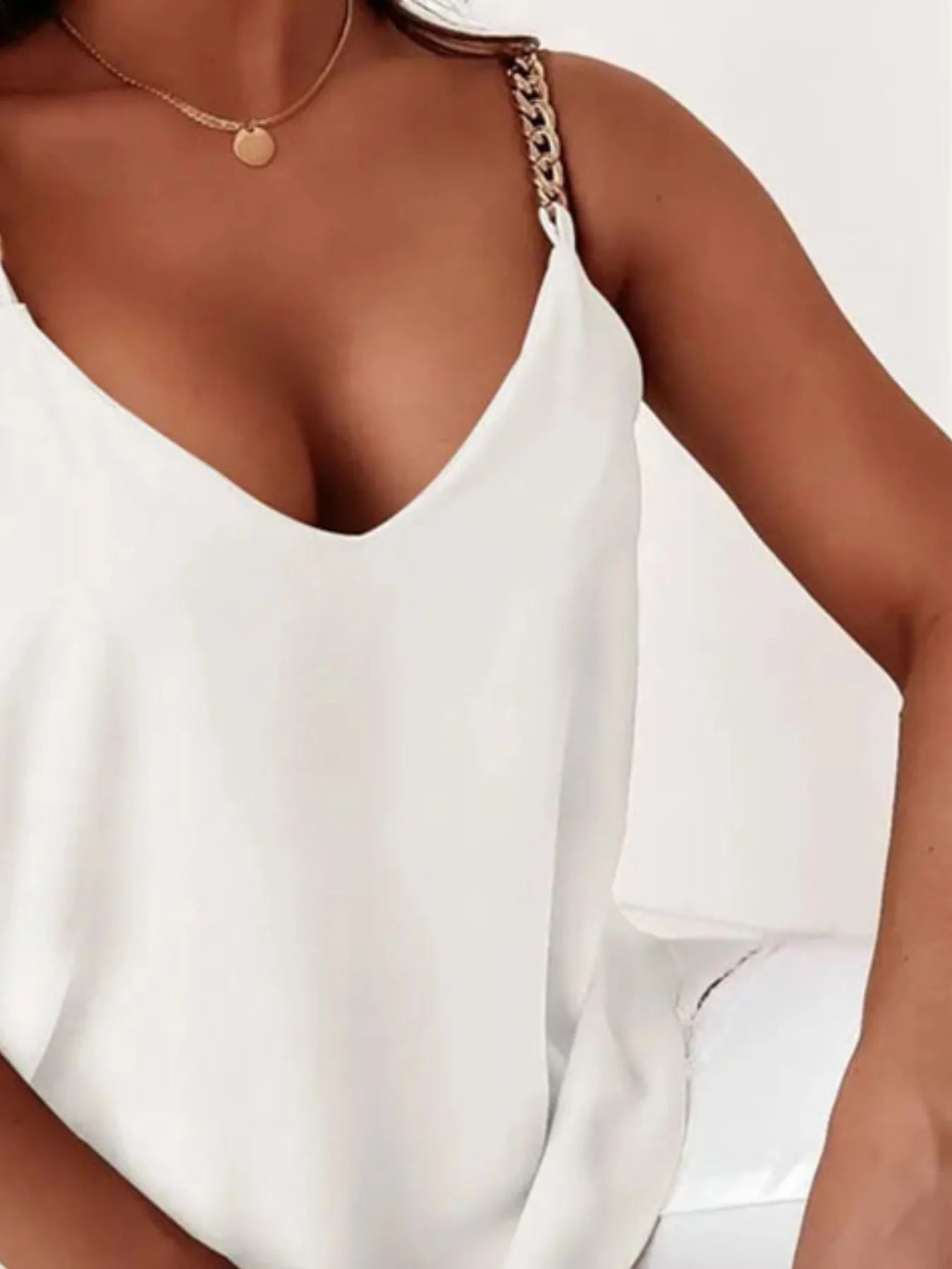 Trendsi white vest with chain straps featuring a v-neck summer top style perfect for warm weather