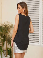 Trendsi V-neck cami top in black featuring a stylish back and relaxed fit for casual wear