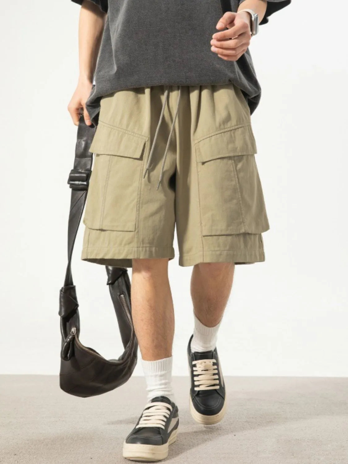 Trendsi comfortable men's cargo shorts in beige with large pockets and drawstring waist