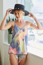 Trendsi tie dye knit cami vest in pastel colors worn with black hat and denim shorts