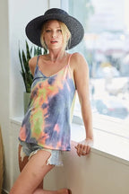 Trendsi tie dye knit cami vest with multicolor pastel tie dye pattern and spaghetti straps worn with denim shorts